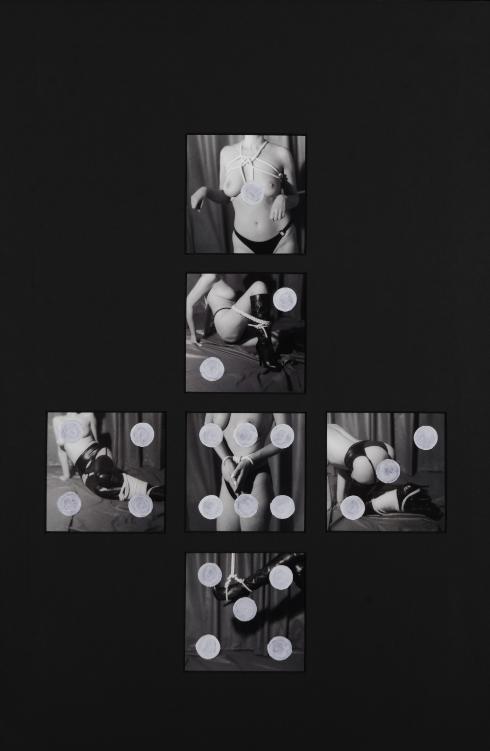 Bondage Dice by Johnny Welch. Six photographs of a semi-nude woman are collaged on each face of a six-sided dice.